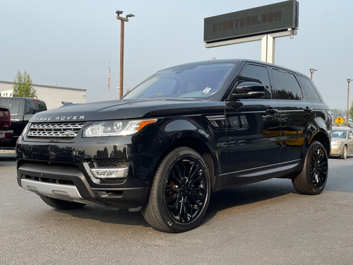 2016 Land Rover Range Rover Sport HSE td6 in black with brown interior, showcasing luxury and rugged capability.