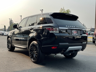 2016 Land Rover Range Rover Sport HSE td6 in black with brown interior, showcasing luxury and rugged capability.