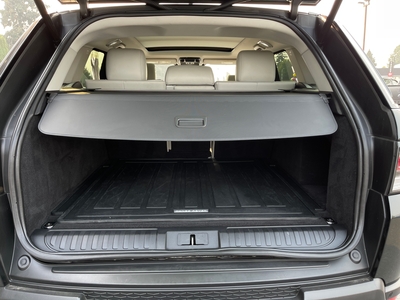 2016 Land Rover Range Rover Sport HSE td6 in black with brown interior, showcasing luxury and rugged capability.