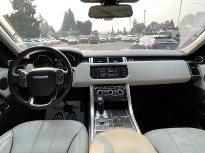 2016 Land Rover Range Rover Sport HSE td6 in black with brown interior, showcasing luxury and rugged capability.