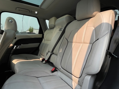 2016 Land Rover Range Rover Sport HSE td6 in black with brown interior, showcasing luxury and rugged capability.