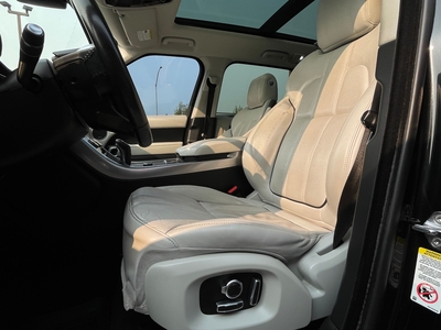 2016 Land Rover Range Rover Sport HSE td6 in black with brown interior, showcasing luxury and rugged capability.